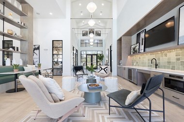 large clubhouse lounge with modern furnishings at Lake Nona Concorde