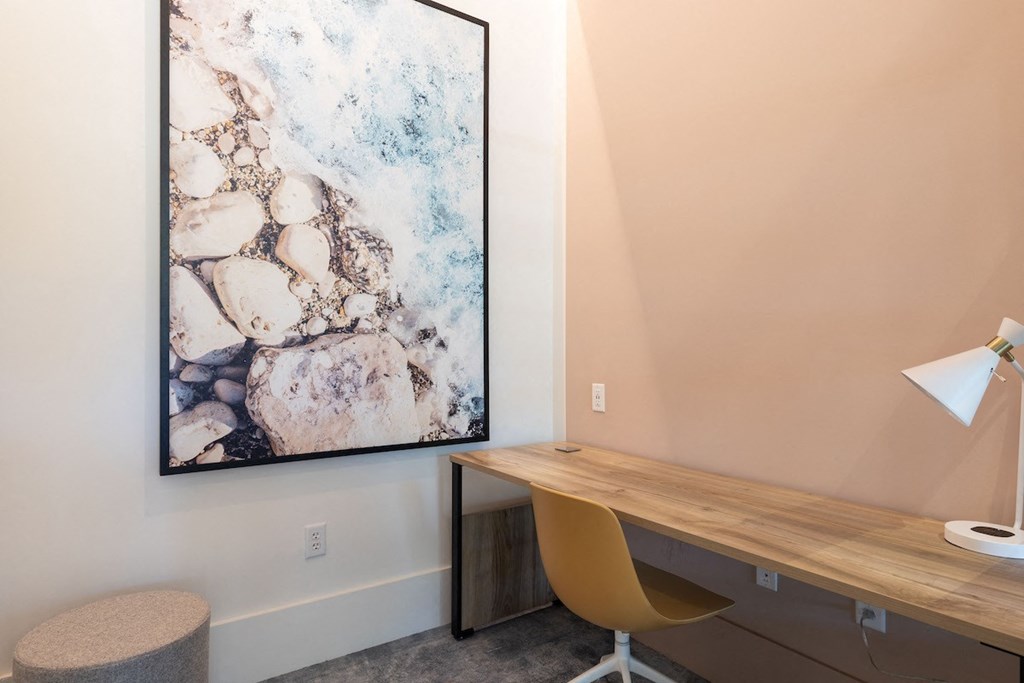 Micro office suite with desk, chair, and lamp
