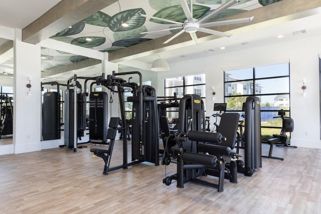 large fitness center with strength and cardio equipment at Lake Nona Concorde
