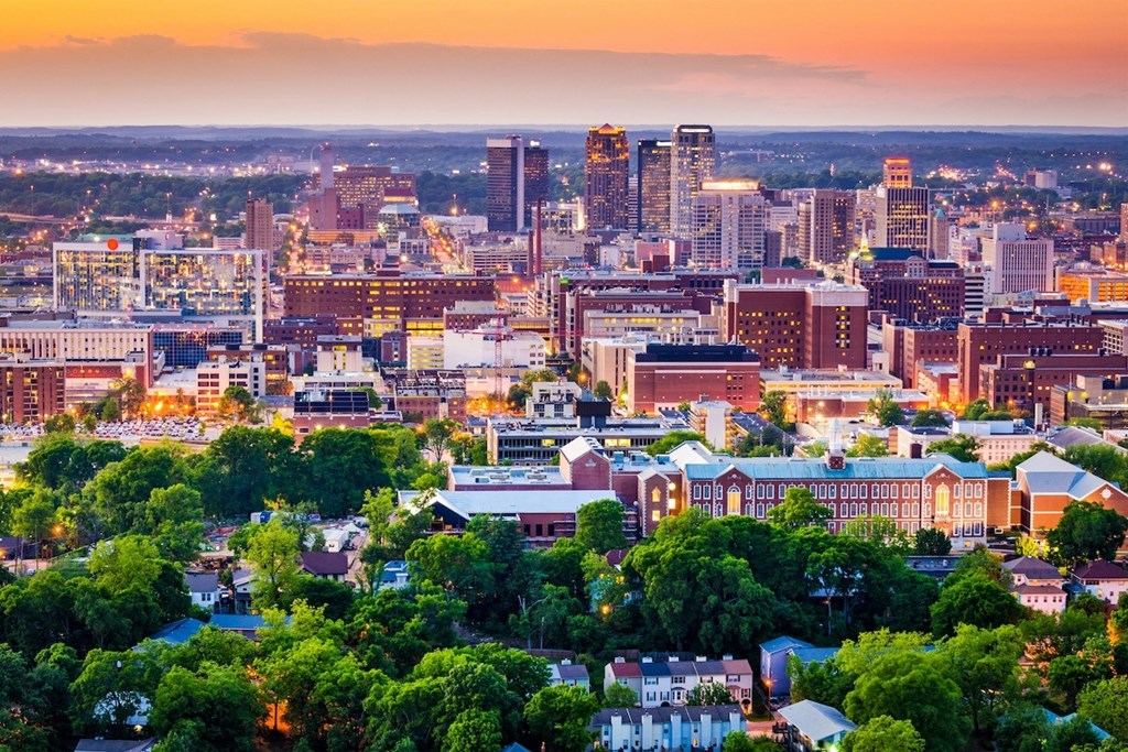 an aerial view of downtown birmingham, alabama at sunset