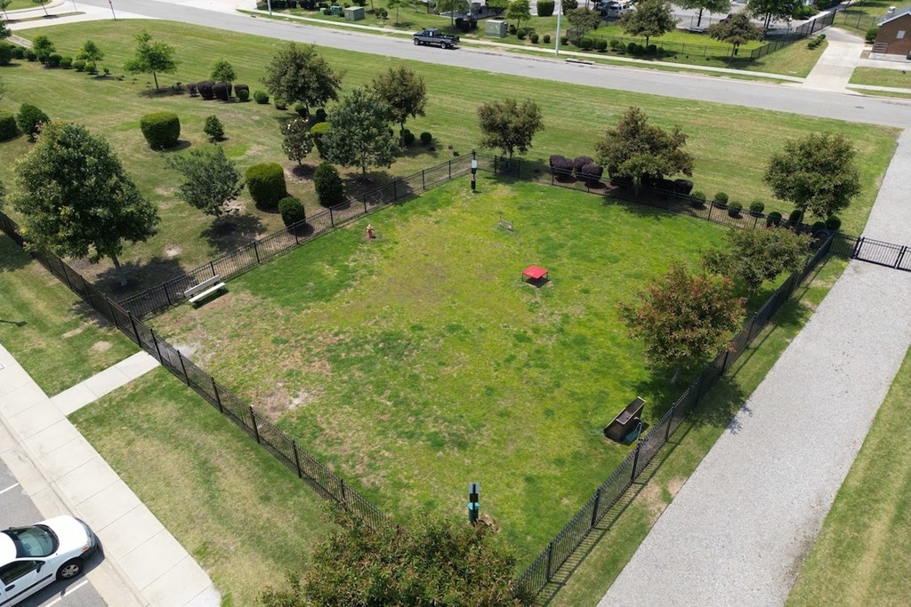 The large fenced in bark park at Fenwyck Manor Apartments in Chesapeake, VA