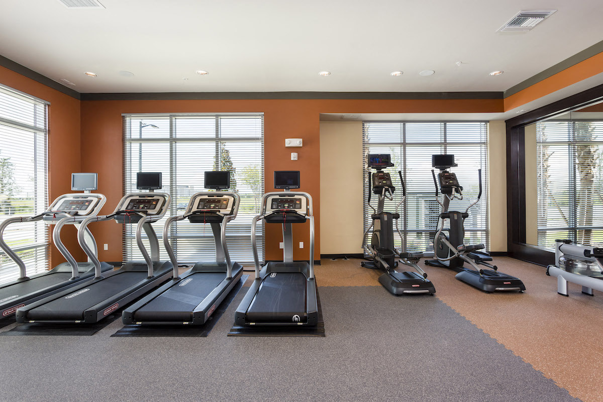 Bank of cardio equipment in fitness center  at LandonHouse in Lake Nona