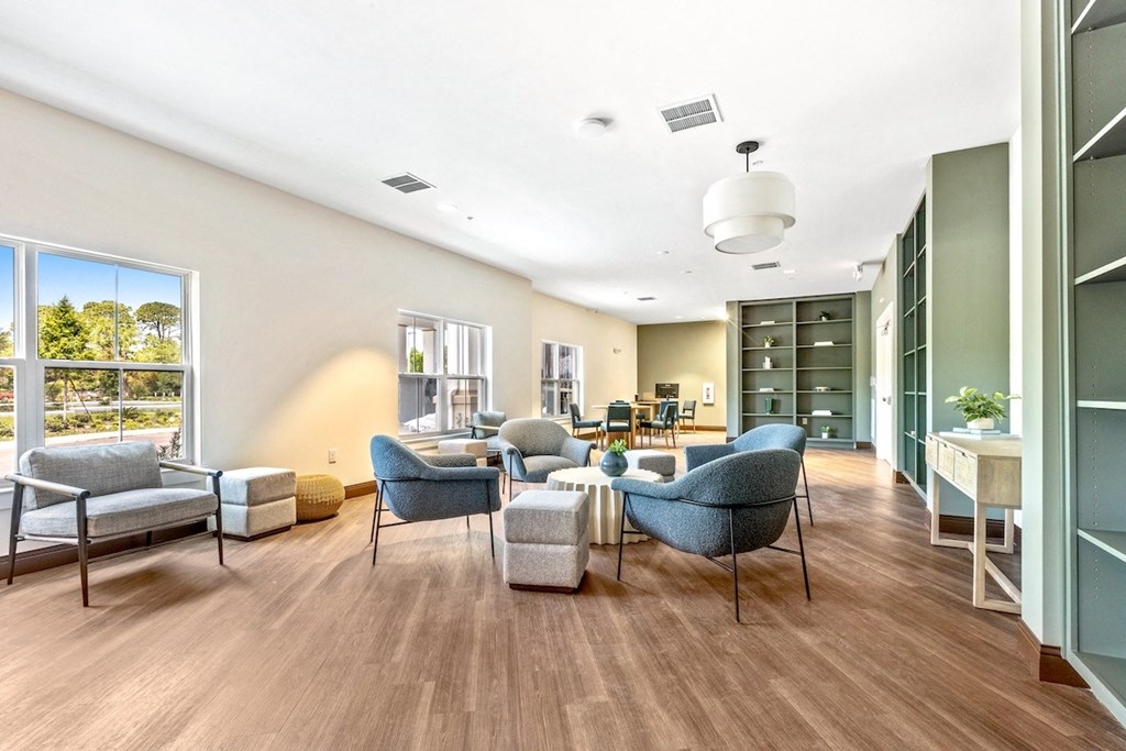 the preserve at ballantyne commons community room with furniture and large windows