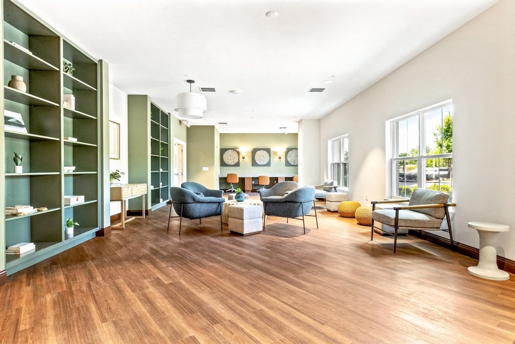 a living room with couches and a table
