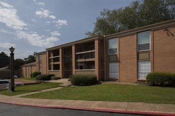 neat sidewalks in front of residential buildings at Hampton House - Photo Gallery 18