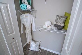 closet with built-in shelving at Havenly Park - Photo Gallery 18