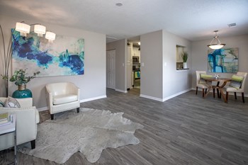 hardwood-style floors and modern lighting in living room - Photo Gallery 23