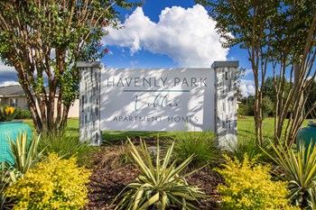 signage with lush landscaping on beautiful day - Photo Gallery 33