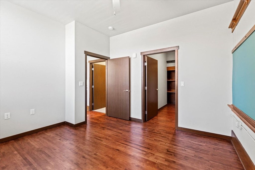 a spacious room with a chalkboard on the wall at 611 Mill Street Horicon, WI 53032