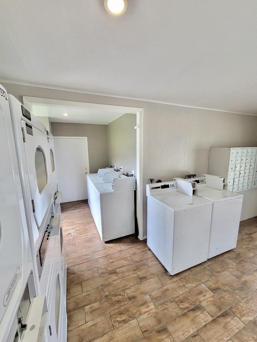 laundry and mail center with coin washers and dryers