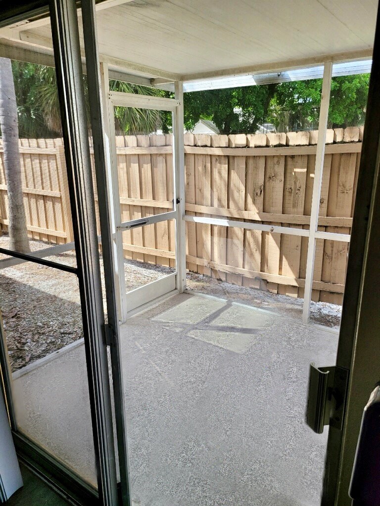 spacious screened-in patio with outside access
