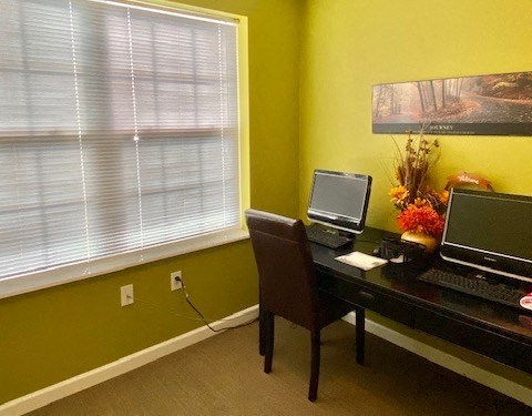 Marion Green business center with computers