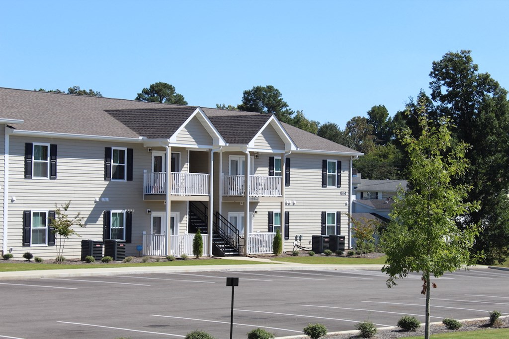 Large parking lot in front of Southbrook Apartment buildings