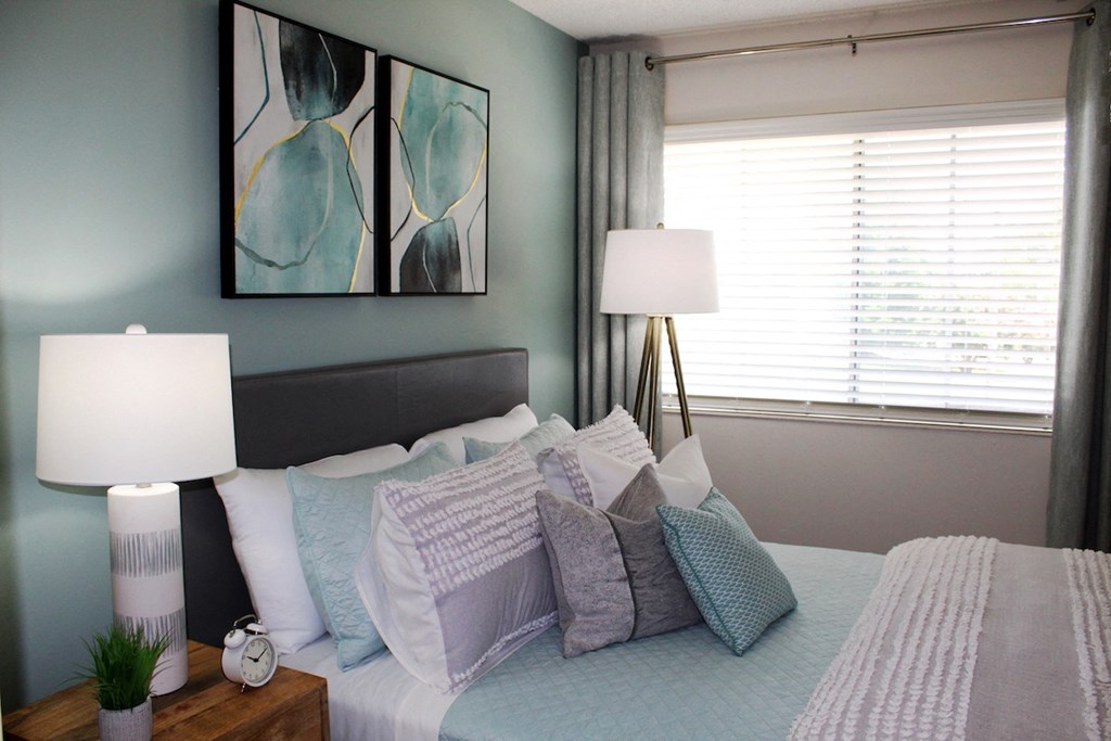 large window in bedroom with model furniture and decor  at Huntsville Landing Apartments, Alabama
