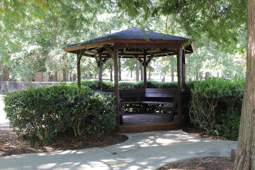 a gazebo with a bench at Stillwater at Grandview Cove in Simpsonville, SC