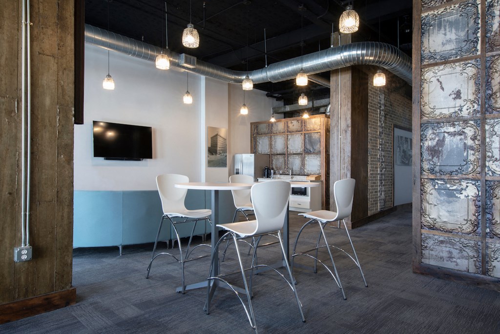 common area with seating and coffee station at Jemison Flats, Birmingham