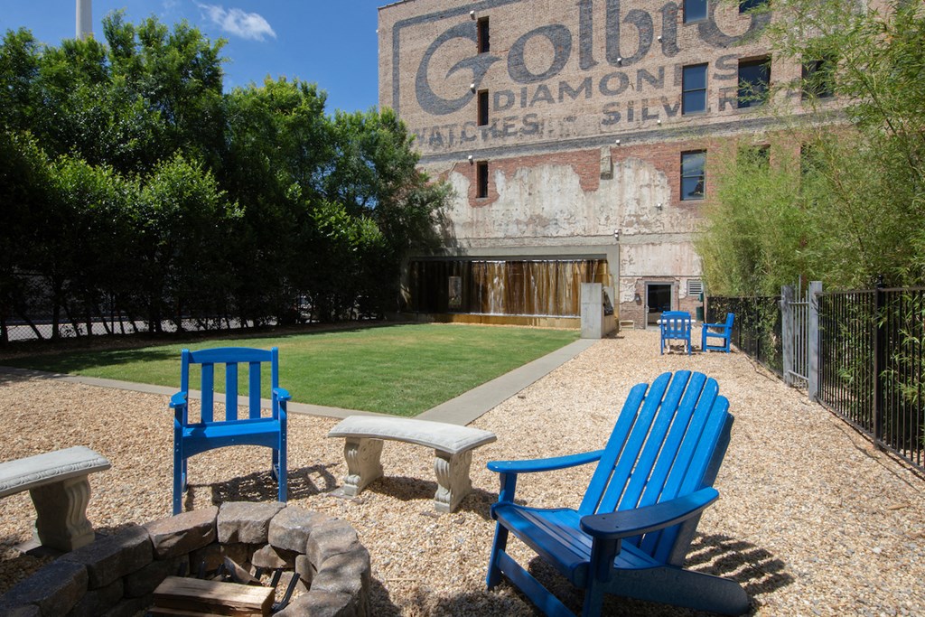 Private Resident Park with fire pit area, green, and waterfall at Jemison Flats, Alabama, 35203