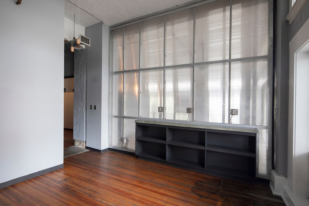 large windows and built in bookshelf at Jemison Flats, Birmingham, Alabama