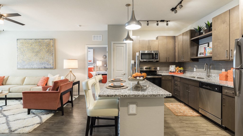 large open concept kitchen with eat-in island