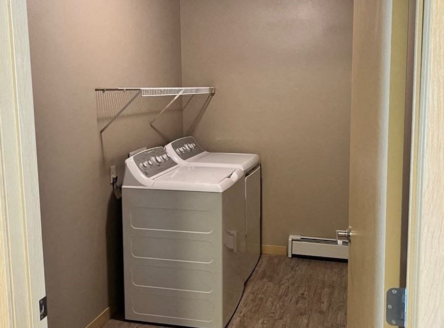 in-home washer and dryer in an apartment at Pioneer Ridge Apartments