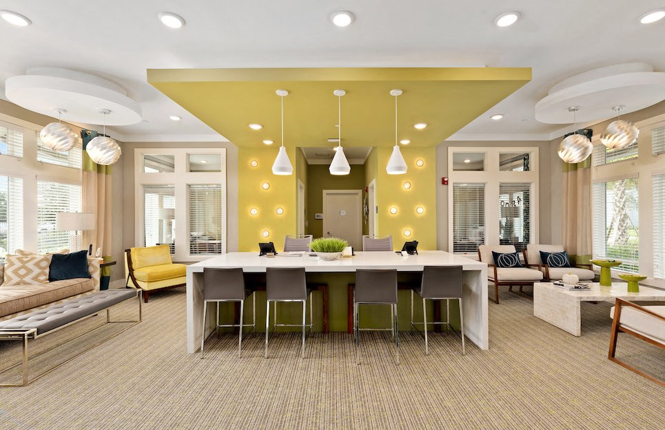 leasing center with work desks and guest chairs