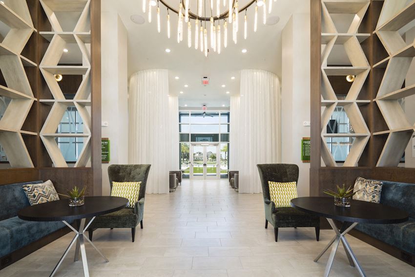 lobby Lobby with private conversation nooks and luxury furnishings at Residences at The Green in Lakewood Ranch, FL - Photo Gallery