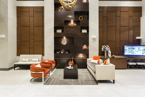 Resident lounge with couch and chairs  at LandonHouse Apartments in Lake Nona, Orlando, FL 32827