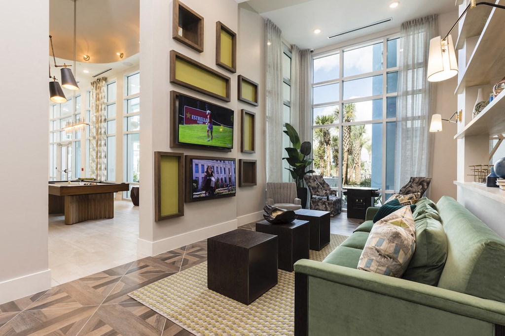 Lounge area with TVs and couches  in Bradenton, FL 34211