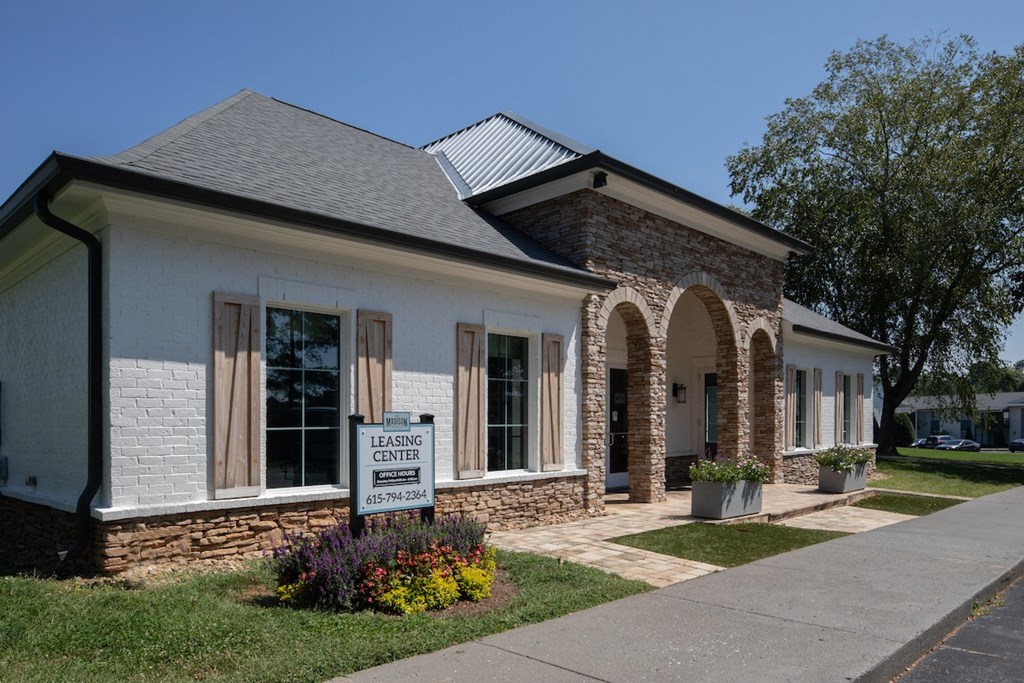 a building with a sign in front of it  at The Madison Franklin, Tennessee, 37064