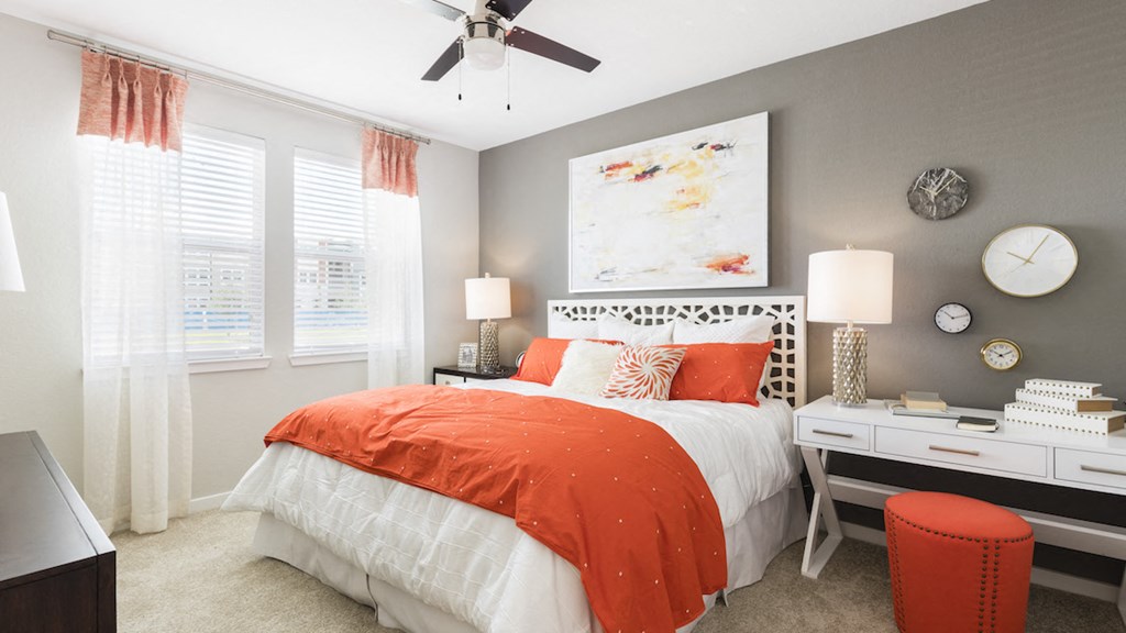 spacious master bedroom with designer paint colors and plush carpet