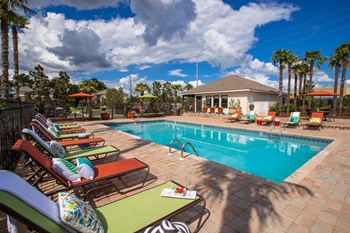 large sundeck and sparkling pool with blue sky and clouds large sundeck and sparkling pool with blue sky and clouds at The Mills at 601, Prattville, AL - Photo Gallery 2
