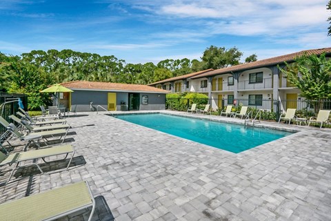 Swimming Pool With Relaxing Sundecks at The Oasis Apartments, Daytona Beach