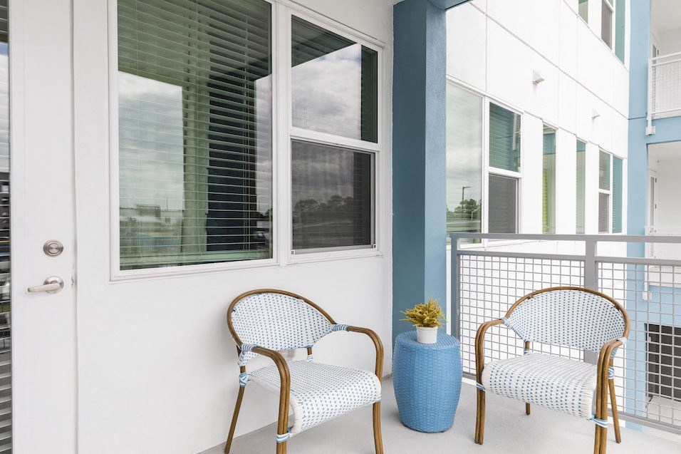 balcony with model patio set at Residences at The Green in Lakewood Ranch