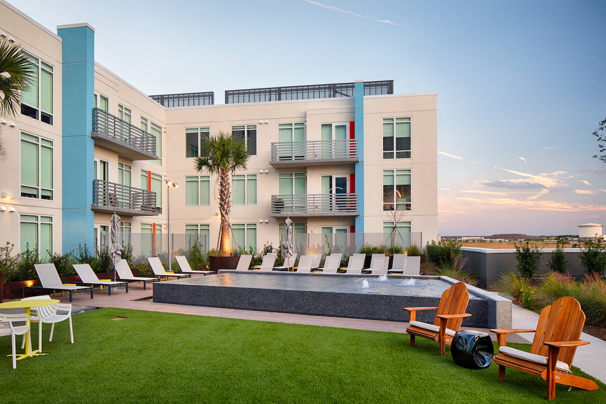Fountain at Lake Nona Pixon surrounded by lounge chairs at Lake Nona Pixon, Florida