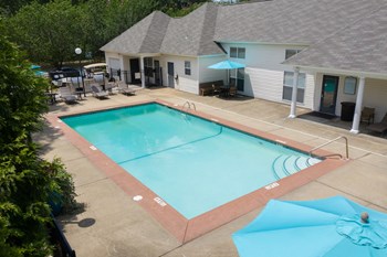 Point-At-Fariview-18 pool and sundeck behind the clubhouse at The Point at Fairview Apartments - Photo Gallery 4