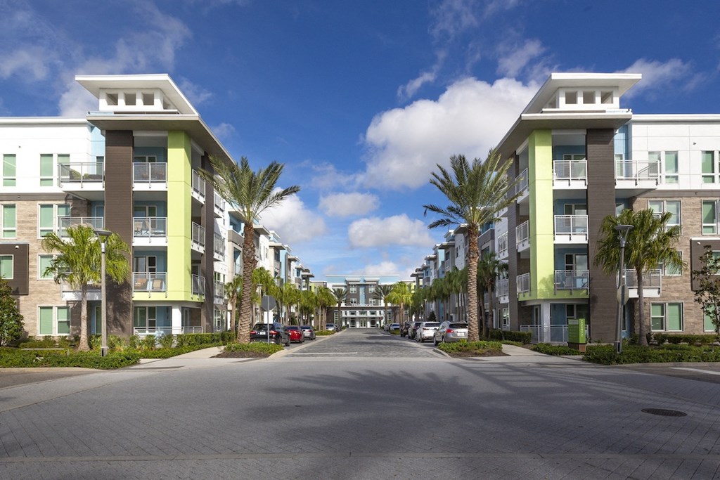 drive-up entrance to Residences at The Green luxury apartments in bradenton, FL