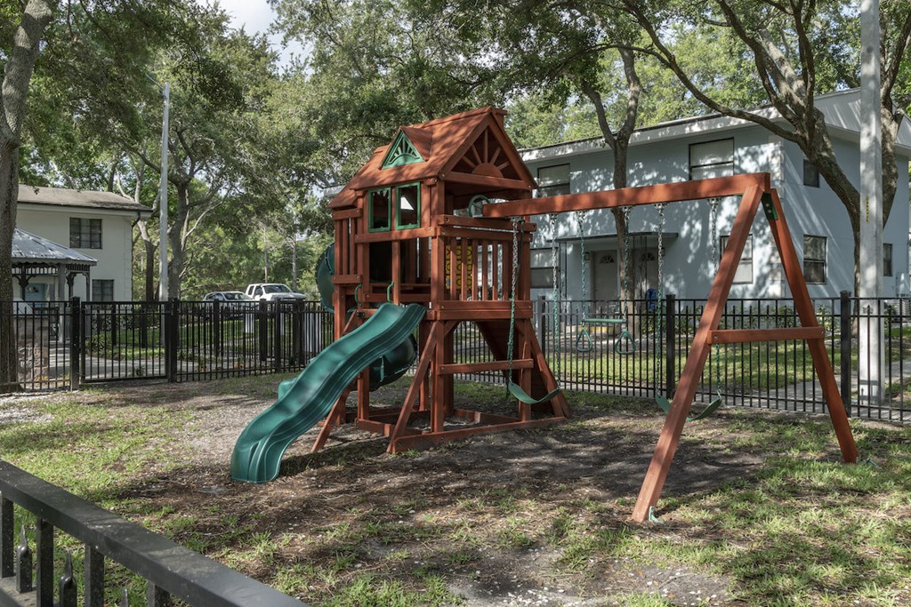 Playground with swings and slide at Terraces at Clearwater Beach, Clearwater