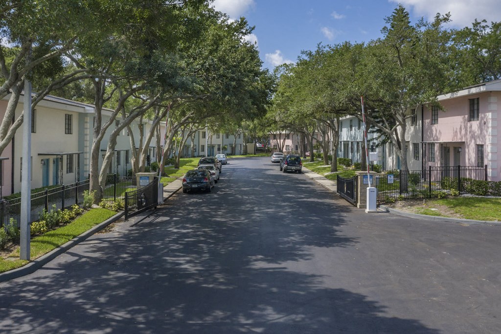 Neat street and open gates at entrance at Terraces at Clearwater Beach, Florida