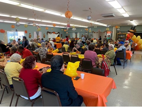 Residents enjoying Thanksgiving in the community dining room
