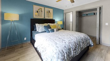 MasterBed1 bedroom with large closet, bathroom access, and model furnishings - Photo Gallery 4
