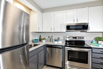 Berry-Kitchen1 kitchen with stainless steel appliances, built-in microwave, and granite countertops - Photo Gallery 2