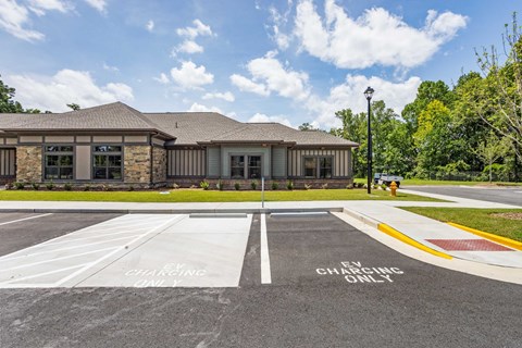 an empty parking lot in front of a building