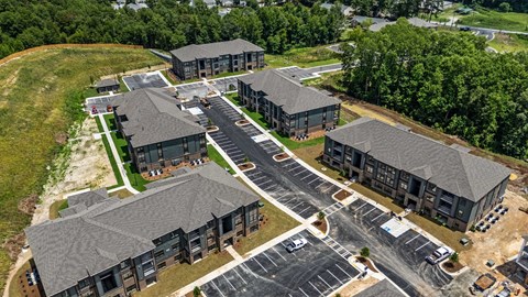 an aerial view of a group of buildings and roads