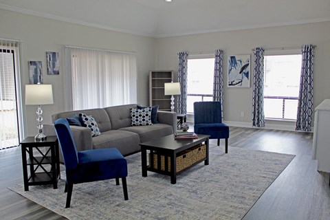 comfortable seating, large windows, and a coffee table in the office at Woodland Villas Apartments, Jasper, 35504