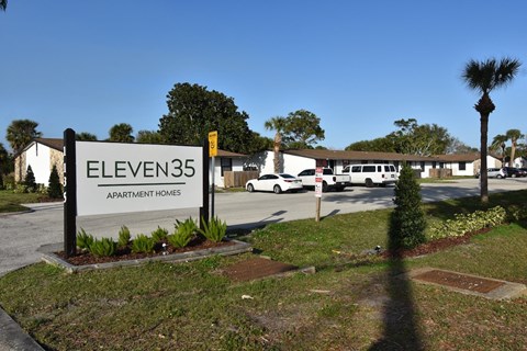 The Eleven35 Apartments sign at the entrance of the community