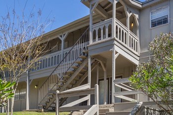 Outside stairs and balcony Outside stairs and balcony at Aspen Run and Aspen Run II Apartments, Tallahassee, FL, 32304 - Photo Gallery 6