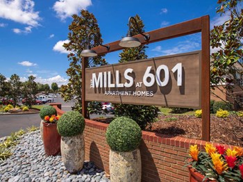 bright blue sky with clouds and The Mills at 601 Entrance sign at The Mills at 601, Prattville - Photo Gallery 9