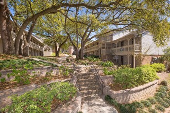 Outside stairs leading to terraced grounds around apartments Outside stairs leading to terraced grounds around apartments at Aspen Run and Aspen Run II Apartments, Florida, 32304 - Photo Gallery 4