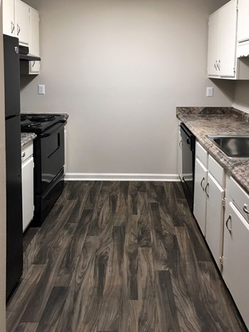 swg-3 kitchen with appliances, ample cabinets, and hardwood-style floor - Photo Gallery 3