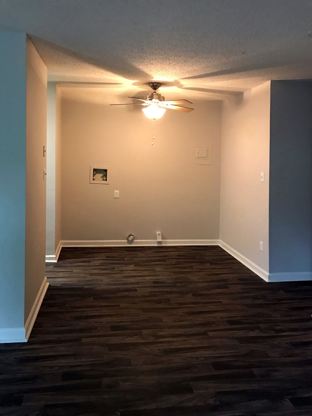 dining area with ceiling fan and hardwood-style floors
